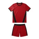 Front view flat lay of the Ignite Pro Custom Soccer Uniform - Red Black Kit featuring a bold red athletic jersey with black diagonal side panels and matching red soccer shorts on a white background
