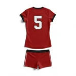 Back view flat lay of the Court Blaze red custom volleyball jersey featuring white number 5 with a black outline and matching compression shorts