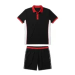 Flat lay front view of the Match Point black padel polo shirt featuring red collar trim, white side accents, and matching shorts